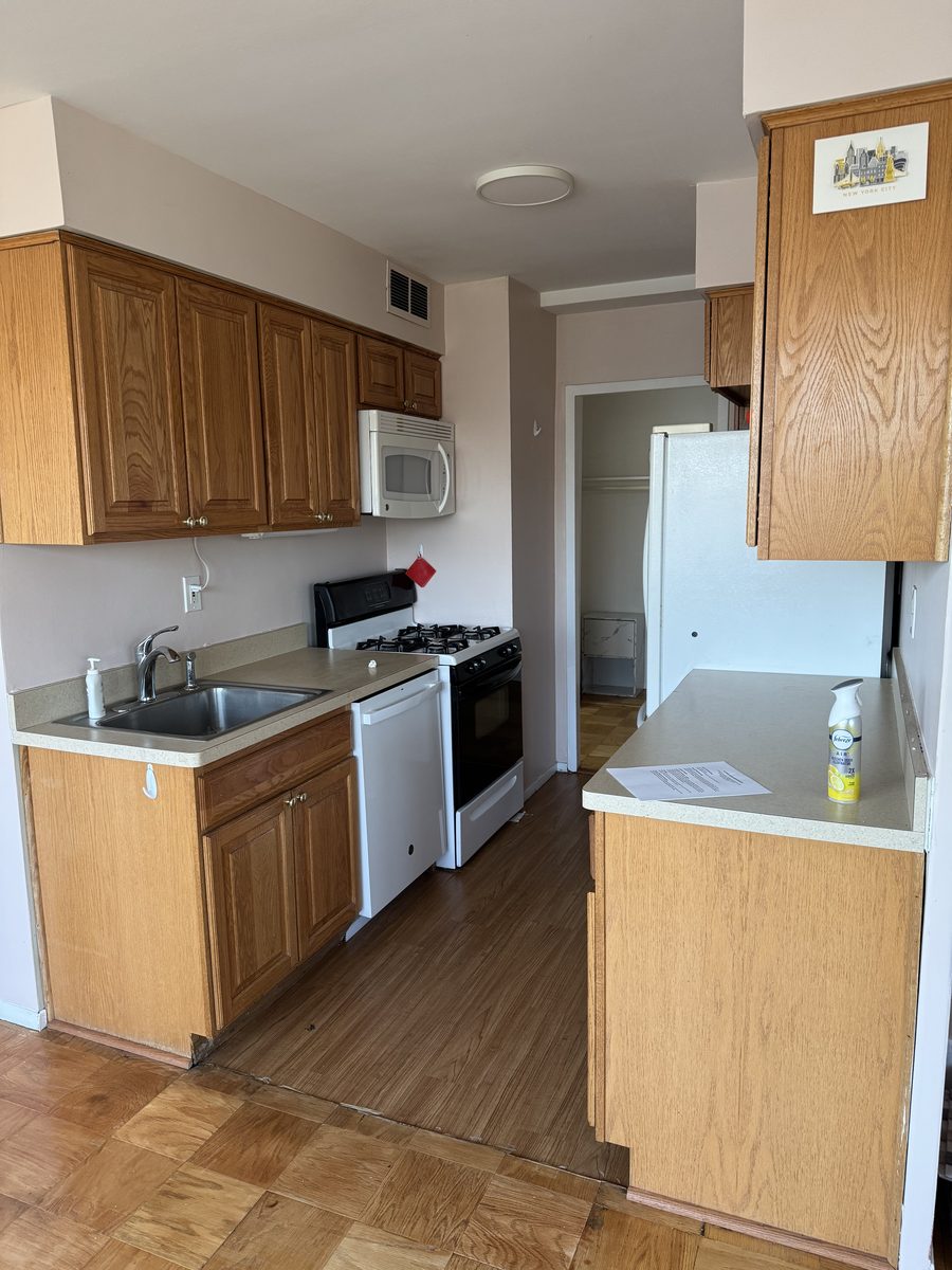 Same kitchen before renovation — oak cabinets and dated appliances, Glen Ridge NJ