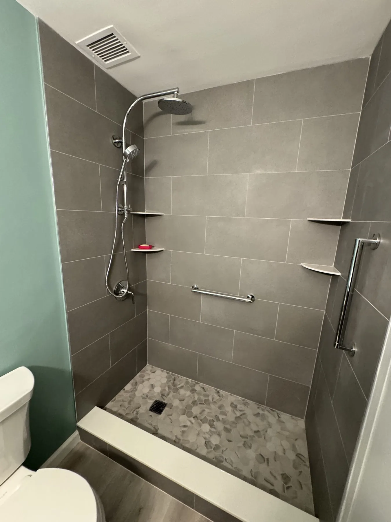 From pink tile to a modern shower after renovation